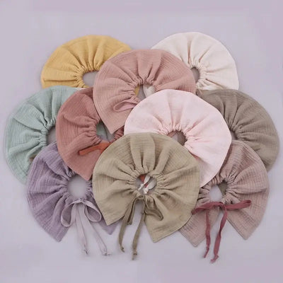 Assorted solid color hair scrunchies in soft fabric, perfect for stylish hair accessories.