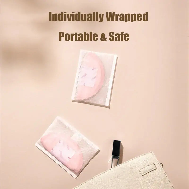 Individually wrapped disposable nursing pads showcasing portability and safety features on a neutral background.