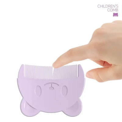 Cute bear-shaped baby comb in purple being held, perfect for gently brushing newborns' fine hair.