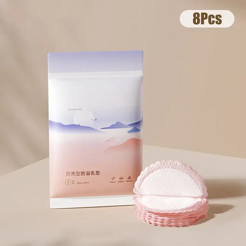 Disposable nursing pads packaging with 8 ultra-soft breast pads for breastfeeding mothers.