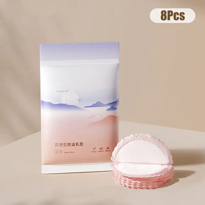 Disposable nursing pads packaging with 8 ultra-soft breast pads for breastfeeding mothers.
