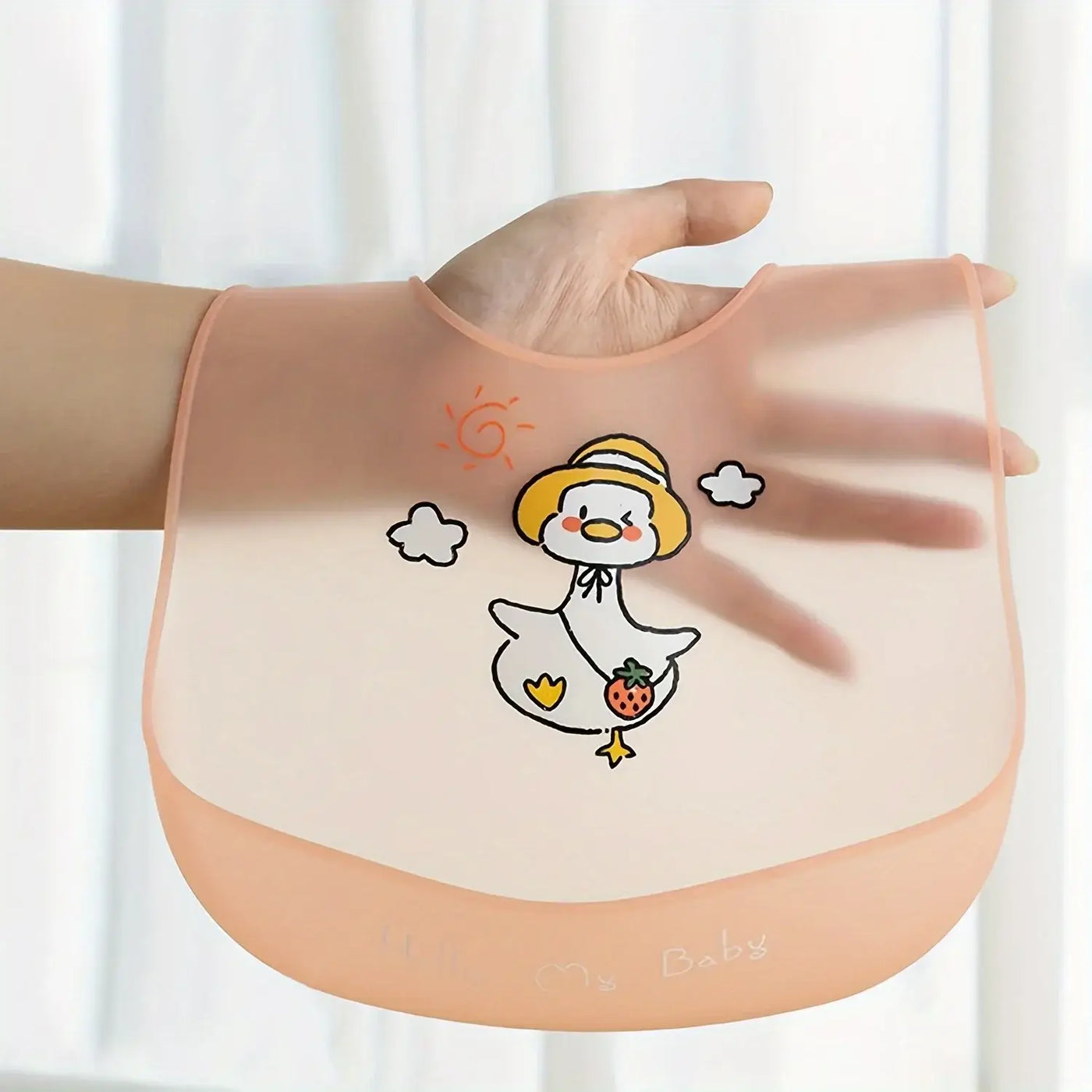 Cute silicone baby bib with cartoon duck design, perfect for unisex kids aged 1-3 for mess-free feeding.