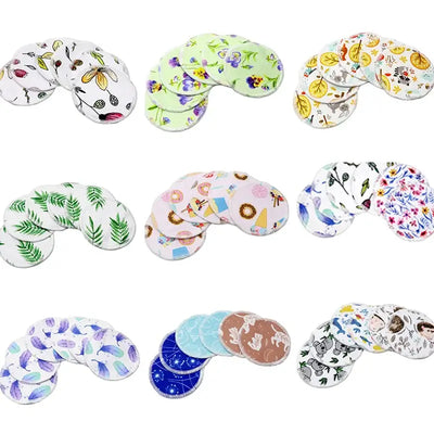 Set of 8 colorful washable nursing pads with various floral and patchwork designs for breastfeeding moms.