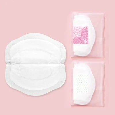 100 disposable nursing breast pads, soft and absorbent, featuring individual packaging for convenience.