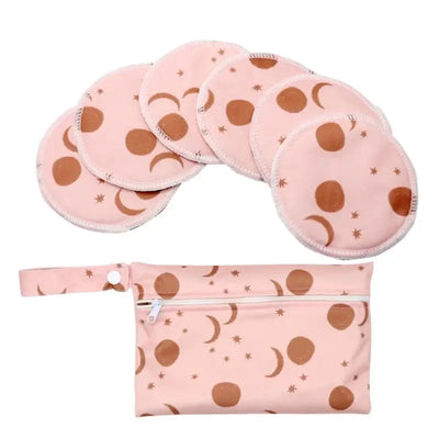 Set of 6 washable nursing pads in pink with moon pattern, along with a matching carrying pouch.