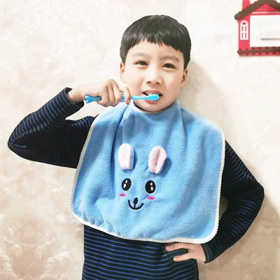Young boy wearing a cute blue cartoon bib while brushing his teeth, ideal for kids aged 3-8 years.