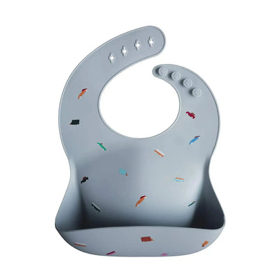 Cute silicone baby bib with colorful cartoon patterns, waterproof and adjustable for toddlers, ideal for mealtime.