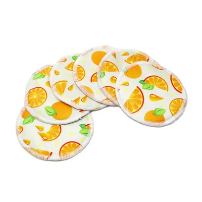 6 washable nursing pads featuring a colorful orange slice pattern, perfect for breastfeeding mothers.