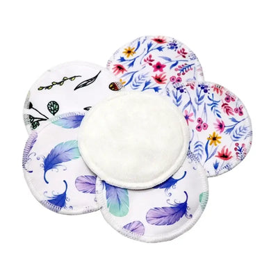 Set of 6 washable nursing pads with floral and feather patterns for breastfeeding mothers, made from bamboo fiber.