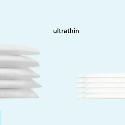 Ultrathin disposable nursing breast pads stacked neatly, showcasing their soft and absorbent design.