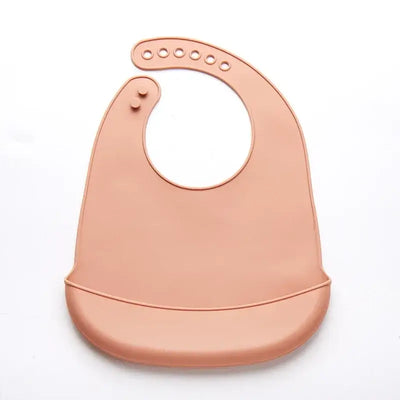Adjustable waterproof baby bib in soft silicone, perfect for drooling and feeding, BPA free, suitable for newborns to toddlers.