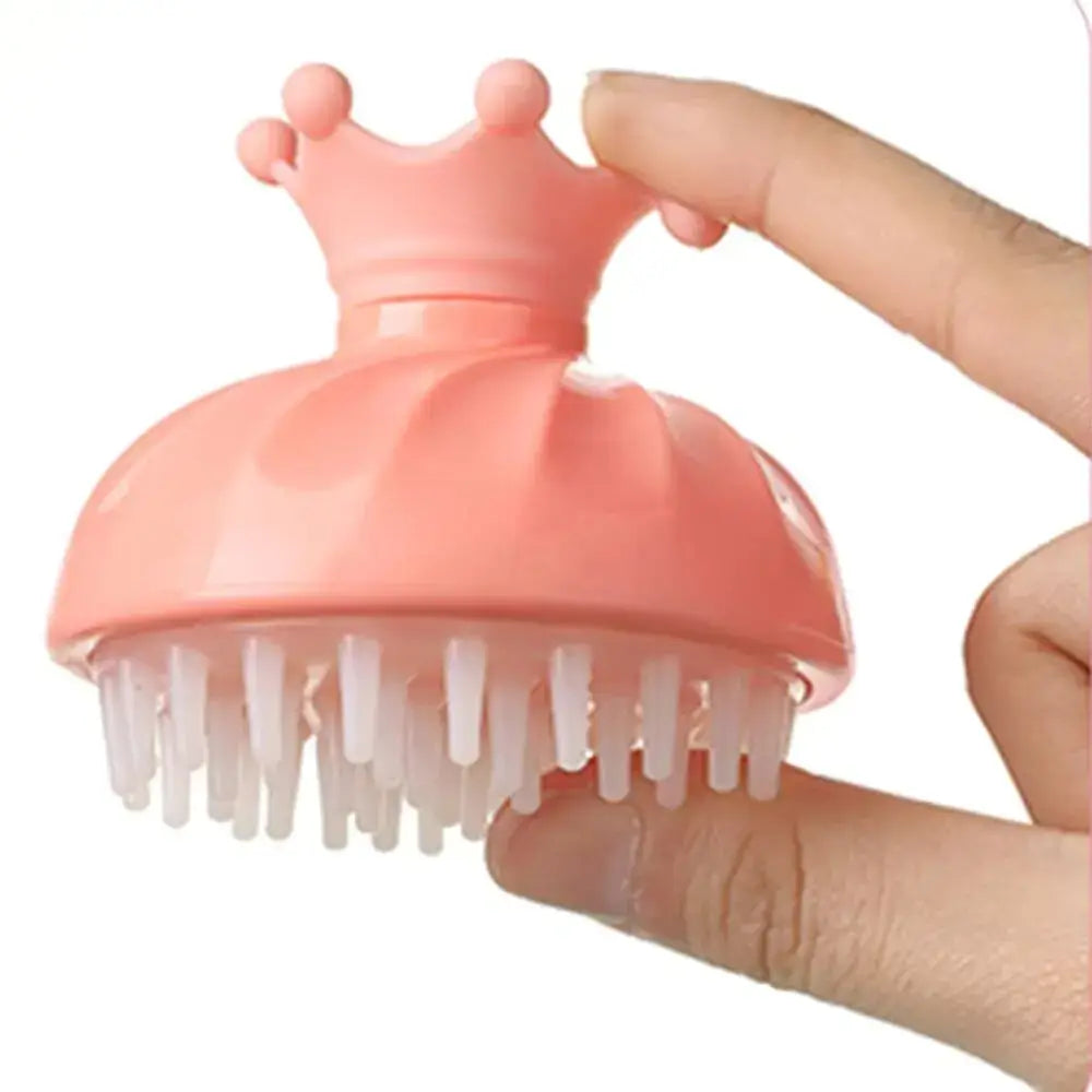 Baby shampoo massage brush with crown design for gentle hair washing and cleaning, ideal for babies 1-3 years old.