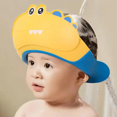 Baby wearing a colorful bathing cap with eye protection while shampooing, designed for fun and comfort during hair washing.