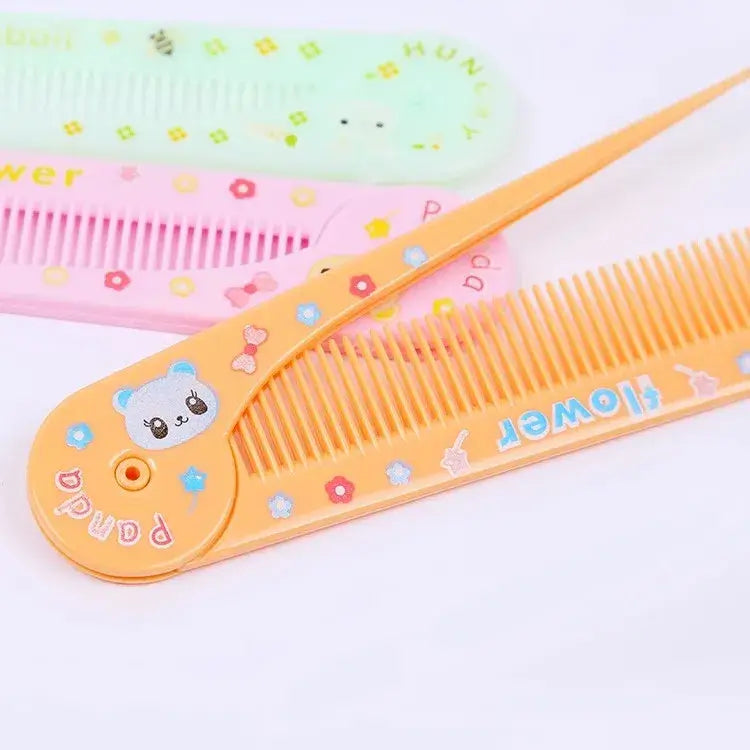 Colorful cartoon baby hair combs in pink, green, and orange, perfect for detangling kids' hair.