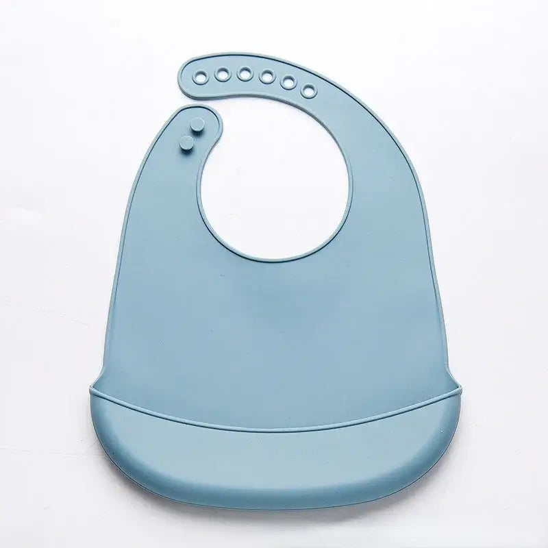 Adjustable blue silicone baby bib, waterproof and soft, perfect for newborns and toddlers, BPA free.