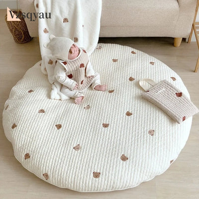 Soft cotton padded play mat for newborns, ideal for crawling, play, and room décor.