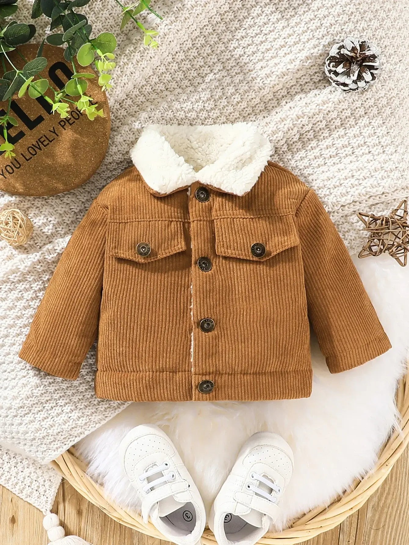 Warm brown corduroy jacket for newborns with faux fur collar, ideal winter outerwear for boys. Perfect for casual fashion.