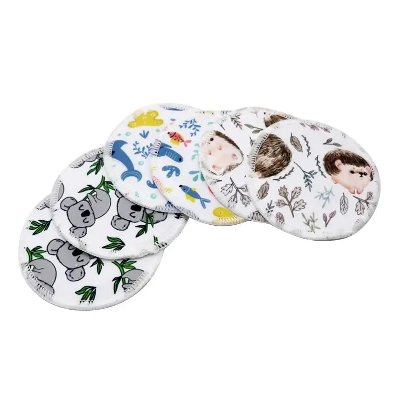 Set of 6 washable nursing pads with cute animal patterns, perfect for breastfeeding mothers.