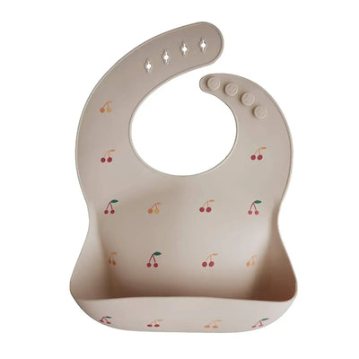 Soft silicone baby bib with cute cherry pattern, adjustable for toddlers, waterproof and easy to clean.