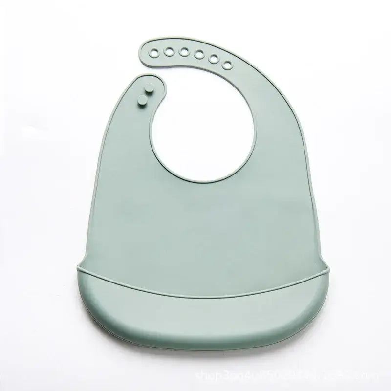 Adjustable waterproof baby bib in soft silicone, perfect for drooling and easy to clean, BPA free, suitable for babies.