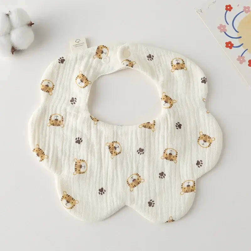 Cotton flower-shaped newborn bib with cute animal print, perfect for feeding and drooling toddlers.